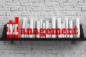 How is management defined?